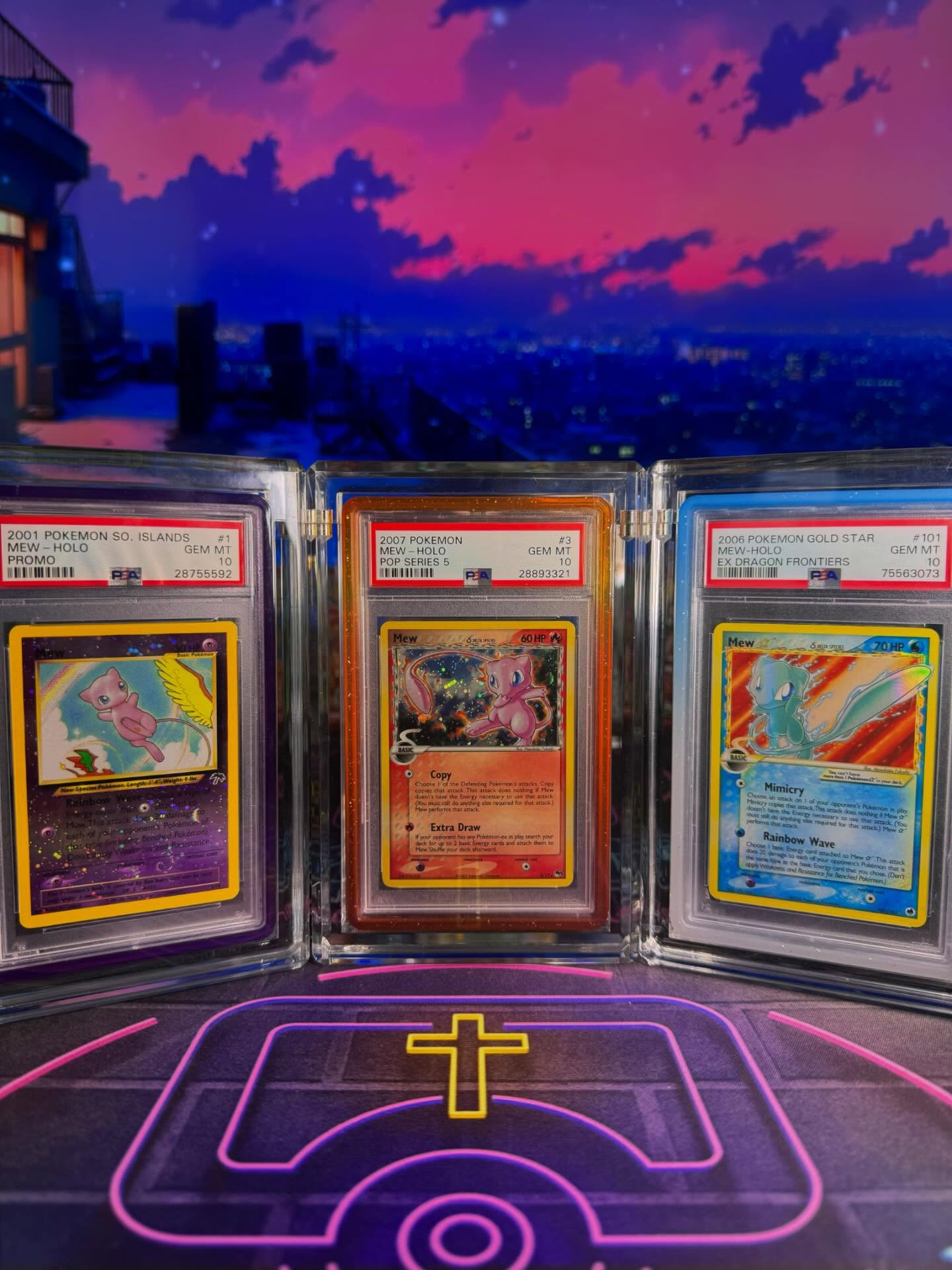 Three PSA 10 Mew Holo cards including a Southern Islands promo