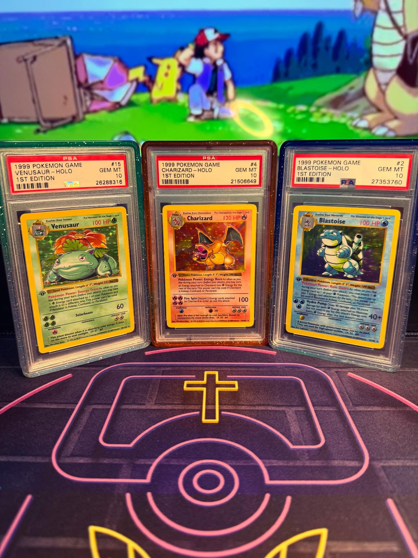 PSA 10 1st Edition Venusaur, Charizard, and Blastoise Holo cards from the 1999 Pokemon Game set